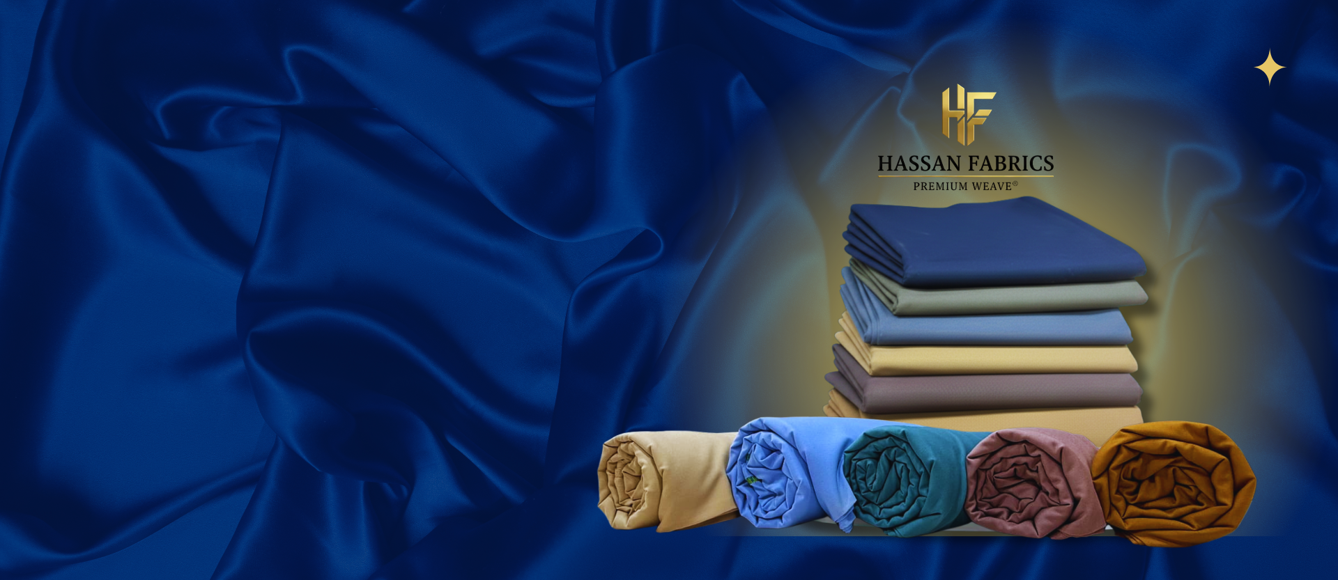 Stack of folded fabrics in various colors with Hassan Fabrics logo on a blue fabric background