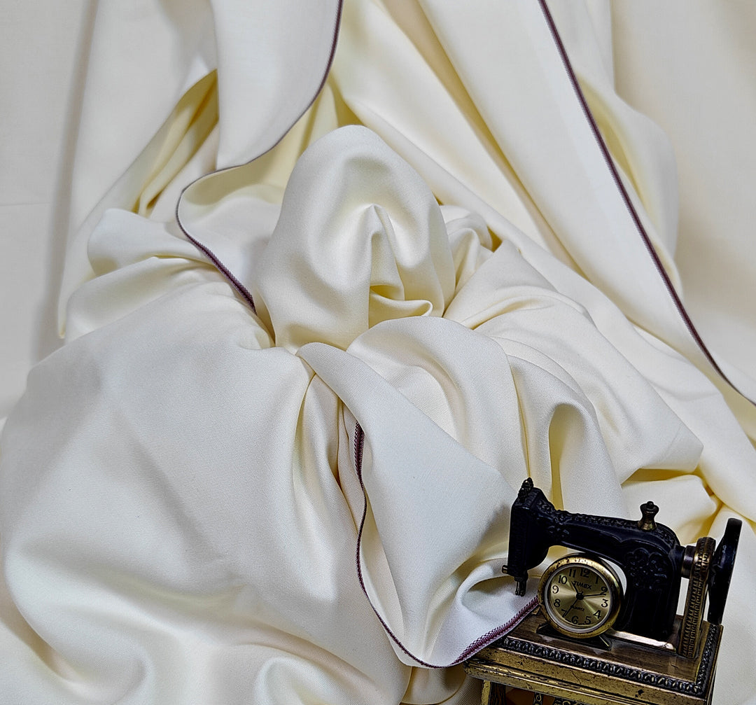 Cream fabric with a vintage sewing machine